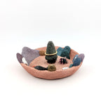 Accessory holder with colourful landscape on white background