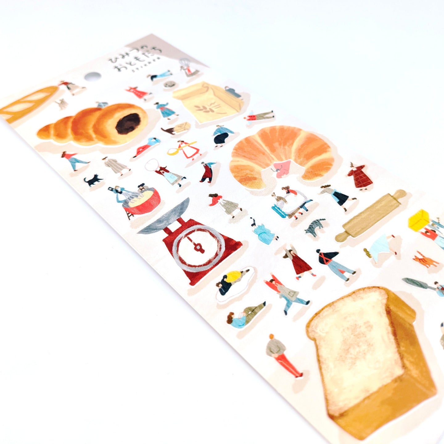 Sticker sheet with theme of baking with little friends on khaki back card placed over white background.