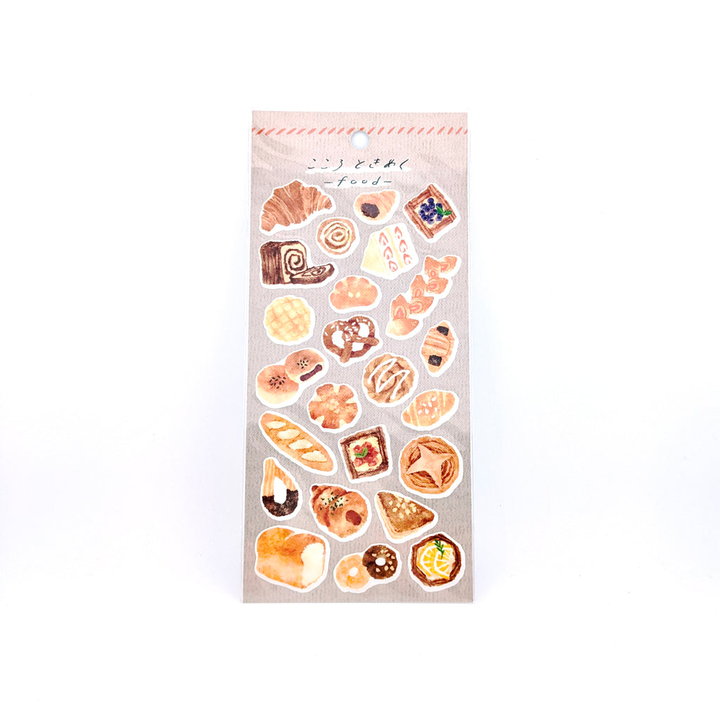 Sheet of bread-themed stickers with khaki back card placed on a white background.