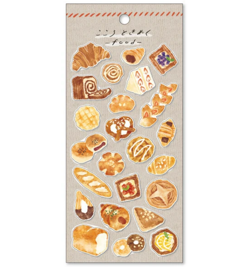 Sheet of bread-themed stickers with khaki back card placed on a white background.