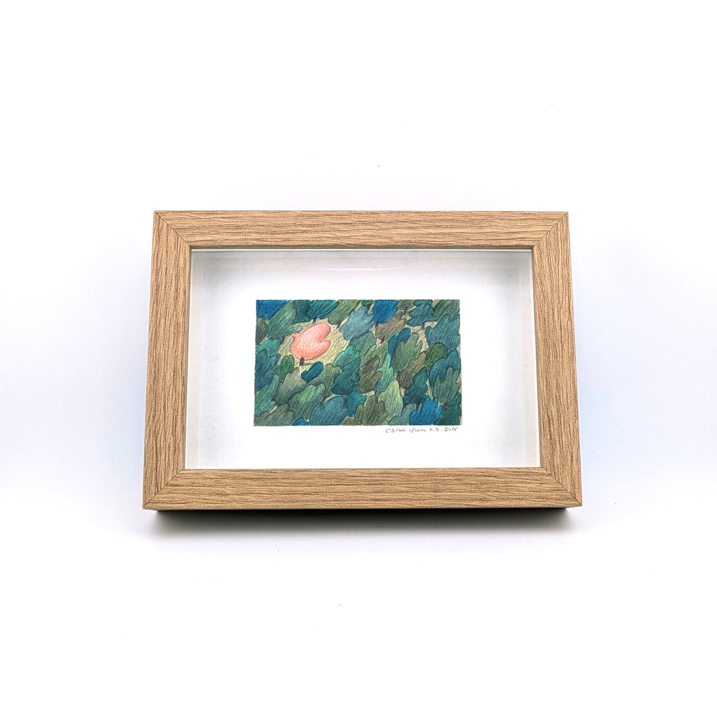 Colour pencil drawing of trees in nature, with wooden textured frame.