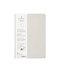 A Kled Notes paper notebook in a light beige color, featuring a white paper label on the left side with product details and illustrations, set against a plain white background.