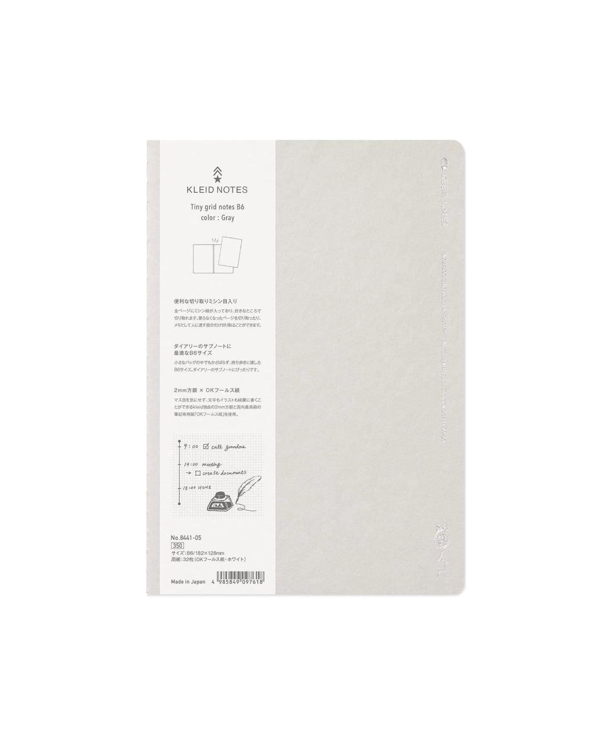 A Kled Notes paper notebook in a light beige color, featuring a white paper label on the left side with product details and illustrations, set against a plain white background.