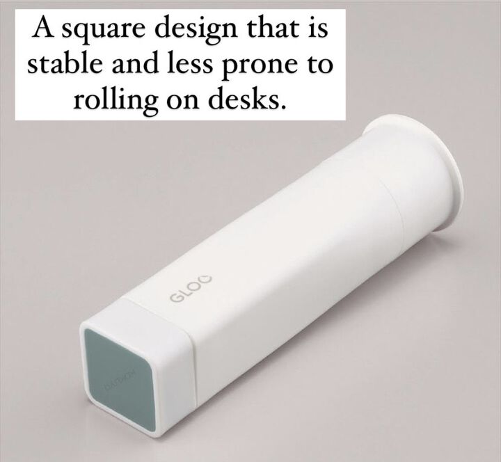 White square glue stick on light grey background.