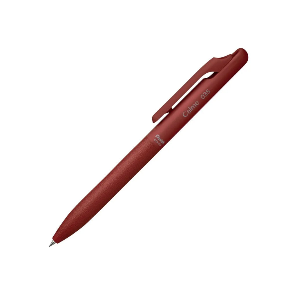 Pentel Calme 0.35 red pen in plastic on white background.