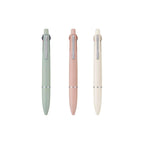 Multi-colour pens in sage green, coral & cream white on white background.