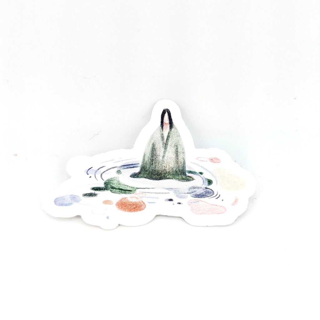 Sticker with a design of a person standing on a mountain peak with colorful circles around them, on a white background.